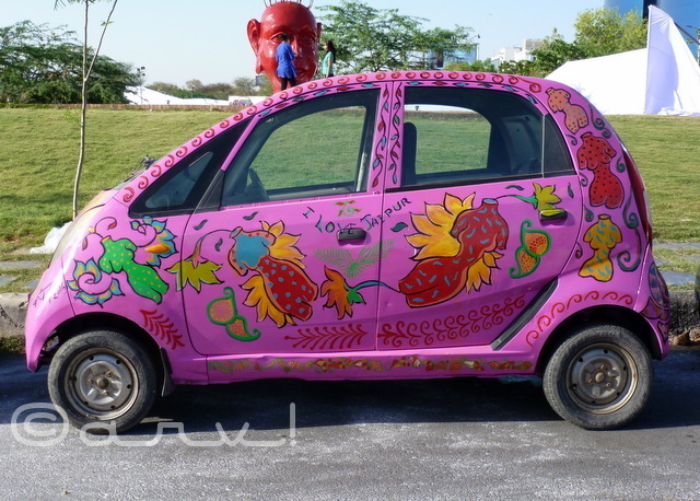 : hand-painted-tata-nano-in-pink-color-at-cartist-exhibition-jaipur