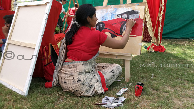artist painting canvas at cartist jaipur