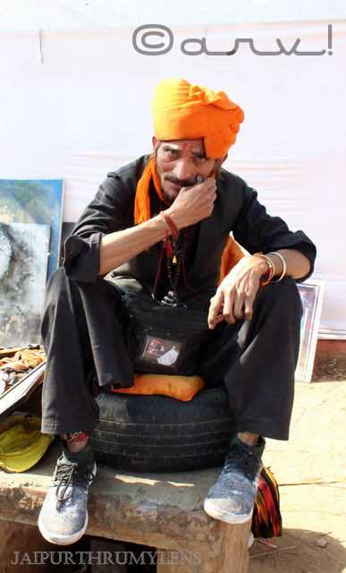 indian man in orange turban kala mahotsav jaipur