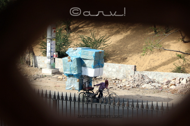 looking-through-peep-hole
