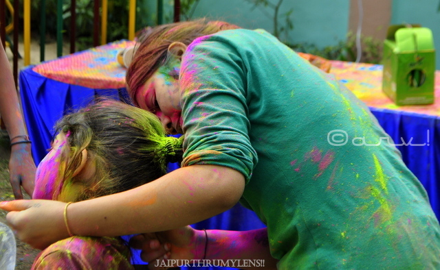 kids-applying-colour-holi-festival-celebration-jaipur-india