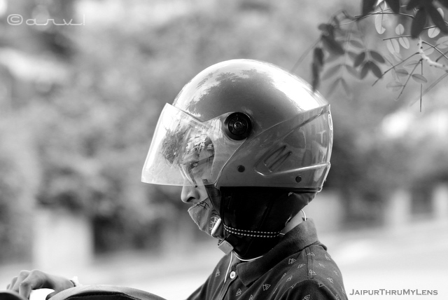 boy-with-face-mask-and-helmet-indian-street-photography-candid